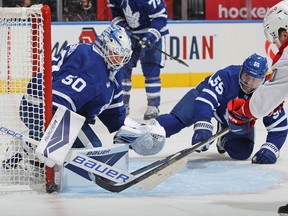 Erik Kallgren of the Toronto Maple Leafs makes a tight save against Juraj Slafkovsky of the Montreal Canadiens during an NHL pre-season game at Scotiabank Arena on September 28, 2022 in Toronto, Ontario, Canada.