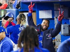 Teoscar Hernandez of the Toronto Blue Jays celebrates his home run against the Boston Red Sox in the dugout during the second inning of the MLB game at the Rogers Centre on October 2, 2022 in Toronto, Ontario, Canada.