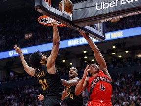 Scottie Barnes of the Toronto Raptors puts up a shot against Jarrett Allen of the Cleveland Cavaliers in the second half at Scotiabank Arena on October 19, 2022 in Toronto, Canada.