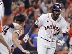 Yordan Alvarez #44 of the Houston Astros celebrates after hitting a walk-off home run against the Seattle Mariners during the ninth inning in game one of the American League Division Series at Minute Maid Park on October 11, 2022 in Houston, Texas.