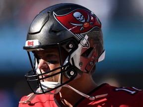 Tom Brady of the Tampa Bay Buccaneers looks off in the fourth quarter against the Carolina Panthers at Bank of America Stadium on October 23, 2022 in Charlotte, North Carolina.