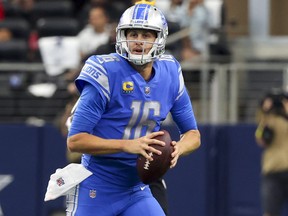 Jared Goff of the Detroit Lions attempts a pass during the fourth quarter against the Dallas Cowboys at AT&T Stadium on October 23, 2022 in Arlington, Texas.