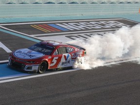 Kyle Larson, driver of the #5 Valvoline Chevrolet, celebrates with a burnout after winning the NASCAR Cup Series Dixie Vodka 400 at Homestead-Miami Speedway on October 23, 2022 in Homestead, Florida.