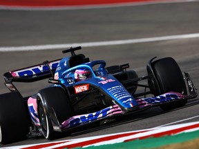 Fernando Alonso of Spain driving the (14) Alpine F1 A522 Renault on track during the F1 Grand Prix of USA at Circuit of The Americas on October 23, 2022 in Austin, Texas.