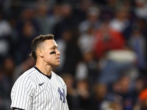 Aaron Judge of the New York Yankees looks on during the sixth inning against the Houston Astros in game four of the American League Championship Series at Yankee Stadium on October 23, 2022 in the Bronx borough of New York City.