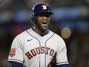 Yordan Alvarez of the Houston Astros reacts after hitting an RBI single to tie the game during the seventh inning against the New York Yankees in game four of the American League Championship Series at Yankee Stadium on October 23, 2022 in the Bronx borough of New York City.