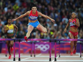 Natalya Antyukh of Russia jumps a hurdle in the Women's 400m Hurdles semifinal on Day 10 of the London 2012 Olympic Games at the Olympic Stadium on August 6, 2012 in London, England.