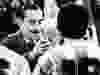 Former Argentine dictator Jorge Rafael Videla (L) presents the World Cup trophy to Argentine national soccer team captain Daniel Passarella after the Argentine vs Netherlands match on June 25, 1978. FILE / Getty Images