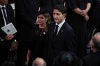 Canada's Prime Minister Justin Trudeau and his wife Sophie Gregoire Trudeau attend the State Funeral Service for Britain's Queen Elizabeth II at Westminster Abbey in London on Sept. 19, 2022.