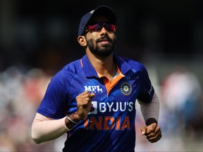 In this file photo taken on July 14, 2022, India's Jasprit Bumrah reacts during the Second Royal London One Day International (ODI) cricket match between England and India at the Lord's cricket ground in London. - India's pace spearhead Bumrah was on October 3, 2022 ruled out of the Twenty20 World Cup in Australia starting later this month with a back injury, the country's cricket board said.