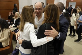 Parkland school shooter sentenced to life for killing 17 people 4 Victims' family members Linda Beigel Schulman, Michael Schulman, Patricia Padauy Oliver and Fred Guttenberg embrace inside the courtroom for an expected verdict in the penalty phase of the gunman's trial Marjory Stoneman Douglas Nikolas Cruz High School at the Broward County Courthouse in Fort Lauderdale, Florida on October 13, 2022.