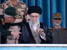 A handout picture provided by the office of Iran's Supreme Leader Ayatollah Ali Khamenei on Oct. 3, 2022, shows him attending a joint graduation ceremony for cadets of armed forces academies in the capital Tehran.