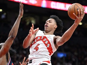 Apr 28, 2022; Toronto, Ontario, CAN;  Toronto Raptors forward Scottie Barnes (4) shoots the ball against the Philadelphia 76ers in the second half during game six of the first round for the 2022 NBA playoffs at Scotiabank Arena.