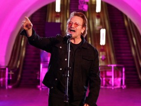 U2 frontman Bono sings during a performance for Ukrainian people inside a subway station in Kyiv, May 8, 2022.