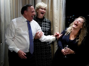 Quebec Premier Francois Legault and his wife Isabelle Brais attend an election night rally in Quebec City, Quebec, Canada, Oct. 3, 2022.