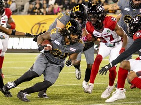 Hamilton Tiger-Cats running back Sean Thomas Erlington (31) carries the ball during first half CFL football game action against the Ottawa Redblacks in Hamilton, Ont. on Friday, October 21, 2022.