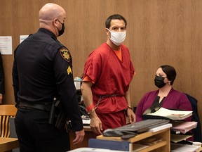 Convicted killer Scott Peterson leaves court after he was resentenced to life in prison without parole during a hearing at the San Mateo County Superior Court in Redwood City, California, December 8, 2021.