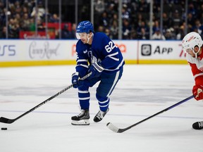 Maple Leafs forward Denis Malgin carries the puck during the pre-season. He has made Toronto's season-opening roster.