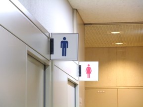 Men's bathroom door and women's bathroom door.