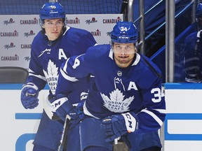 Auston Matthews and Mitchell Marner of the Toronto Maple Leafs hit the ice to play against the Montreal Canadiens in Game Five of the First Round of the 2021 Stanley Cup Playoffs at Scotiabank Arena on May 27, 2021 in Toronto, Ontario, Canada.