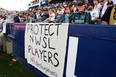 Signage supporting NWSL players is seen during a game between the Los Angeles Galaxy and the Los Angeles FC at Dignity Health Sports Park on October 03, 2021 in Carson, California.