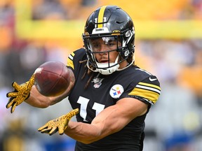 Chase Claypool of the Pittsburgh Steelers catches a pass during warm-ups before a game against the Tampa Bay Buccaneers at Acrisure Stadium on October 16, 2022 in Pittsburgh, Pennsylvania.