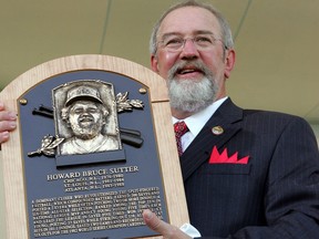 2006 inductee Bruce Sutter poses with his plaque after his speech at Clark Sports Center during the Baseball Hall of Fame induction ceremony on July 30, 2006 in Cooperstown, New York.