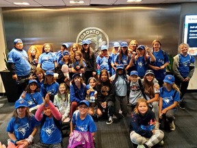 Members of the Girls at Bat program, started by High Park Public School teacher Kelly-Anne Lemieux, travelled from Sarnia to take in Game 1 of the Blue Jays Mariners Wildcard Series in a luxury box on Friday, Oct. 7, 2022.