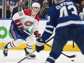 Sep 28, 2022; Toronto, Ontario, CAN; Montreal Canadiens forward Juraj Slafkovsky (20) skates with the puck against the Toronto Maple Leafs in the third period at Scotiabank Arena. Mandatory Credit: Dan Hamilton-USA TODAY Sports