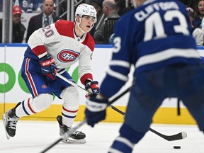 Sep 28, 2022; Toronto, Ontario, CAN; Montreal Canadiens forward Juraj Slafkovsky (20) skates with the puck against the Toronto Maple Leafs in the third period at Scotiabank Arena.
