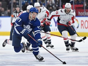 Apr 14, 2022; Toronto, Ontario, CAN;   Toronto Maple Leafs forward Pierre Engvall (47) brings the puck up ice against the Washington Capitals in the second period at Scotiabank Arena.