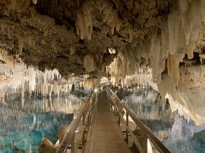 At the Crystal Cave, stalactites surround a clear underground lake 16 metres deep. CYNTHIA MCLEOD/TORONTO SUN