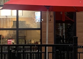 A shattered window is seen from outside a Wendy’s on Queen St. SUPPLIED PHOTO