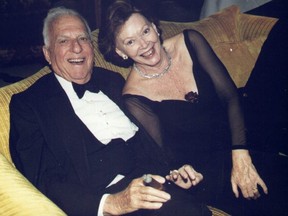 Joan Sutton Straus, the Toronto Sun's first lifestyle editor, shares a laugh with her husband Oscar Straus in this file photo.