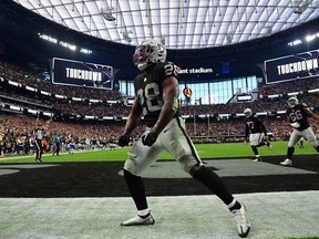 Las Vegas Raiders running back Josh Jacobs celebrates his touchdown scored against the Denver Broncos during the second half at Allegiant Stadium on Oct. 2, 2022 in Paradise, Nevada.