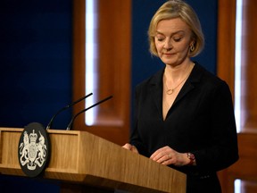 British Prime Minister Liz Truss attends a news conference in London, Oct. 14, 2022.