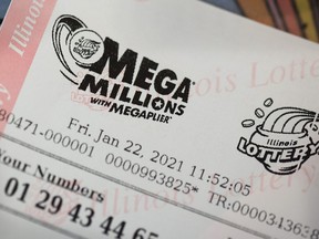 Mega Millions lottery tickets are sold at a 7-Eleven store in the Loop on Jan. 22, 2021 in Chicago.