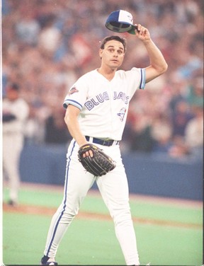Jimmy Key doffs his cap to the crowd after pitching in what would be his final start as a Jay in Game 4 of the 1992 World Series. Key signed with the New York Yankees the following season. FRED THORNHILL/SUN FILES