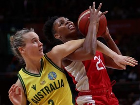 Canada's Nirra Fields, right, and Kristy Wallace of Australia battle for the ball during the 2022 FIBA Women's Basketball World Cup bronze medal match at Sydney Superdome in Sydney, Australia, Saturday, Oct. 1, 2022.