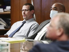 Pete Musico, left, appears before Jackson Circuit Judge Thomas Wilson for trial in a courthouse, in Jackson, Mich., Oct. 4, 2022. Musico and two other men accused of supporting a plot to kidnap Michigan's governor were convicted of all charges Wednesday, Oct. 26, 2022.