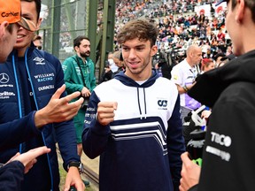 AlphaTauri's French driver Pierre Gasly is pictured before the drivers parade ahead of the Formula One Japanese Grand Prix at Suzuka, Mie prefecture on Oct. 9, 2022.