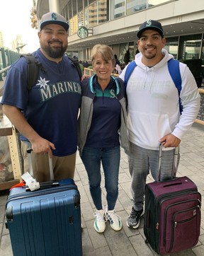 (L to R) Jose Llanes, Denise Corsello and Arturo Lucatero travelled from Seattle to watch their Mariners take on the Blue Jays in a wildcard series.