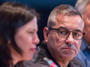 Steve Kanellakos, City Manager of City of Ottawa, listens as Dr. Vera Etches, Medical Officer of Health at Ottawa Public Health, speaks during an information session to provide an update on the city’s plans in response to the COVID-19 pandemic, March 13, 2020.