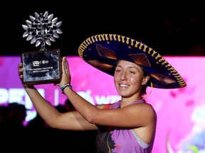 Jessica Pegula of the U.S. celebrates with the trophy after winning her final match against Greece's Maria Sakkari at the Guadalajara Open in Guadalajara, Mexico on October 23, 2022.