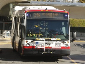 A TTC bus exits a station.