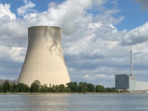 Clouds are seen over the cooling tower of the nuclear power plant Isar 2 by the river Isar amid the energy crisis caused by Russia's invasion of Ukraine, in Eschenbach near Landshut, Germany, Aug. 1, 2022.