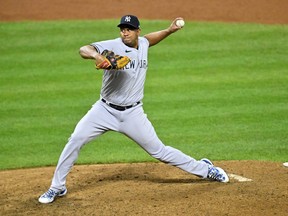 Oct 16, 2022; Cleveland, Ohio, USA; New York Yankees relief pitcher Wandy Peralta (58) throws a pitch against the Cleveland Guardians in the ninth inning during game four of the ALDS for the 2022 MLB Playoffs at Progressive Field.