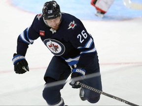 Winnipeg Jets forward Blake Wheeler gives chase during NHL exhibition action against the Ottawa Senators at Canada Life Centre on Tue., Sept. 27, 2022.