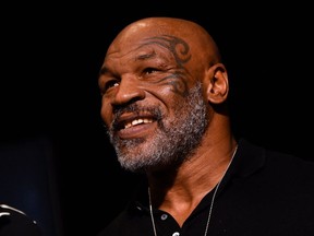 In this file photo taken on November 05, 2021 Mike Tyson attends the weigh-in for boxers Canelo Alvarez and Caleb Plant at MGM Grand Garden Arena in Las Vegas, Nevada.