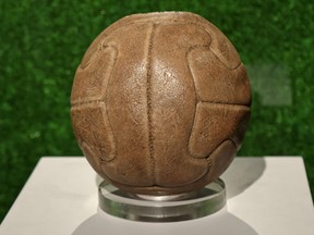 The official match ball for the first FIFA World Cup Uruguay 1930, is on display during the World of Football exhibition which showcases the history and evolution of the sport ahead of the 2022 FIFA World Cup, at the 3-2-1 Qatar Olympic and Sports Museum in the capital Doha on October 2, 2022.